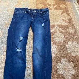 These flying money jeans maybe been worn twice. They are a size 26 in dark blue